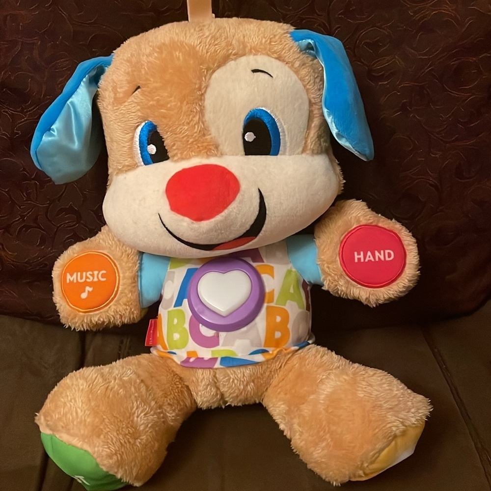 FISHER PRICE:Laugh and learn NWOB Interactive puppy talks and sings.
